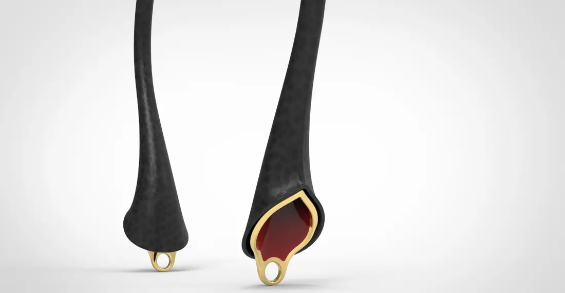 Render del manico in pelle martellata: terminale in ottone e smalto rosso.